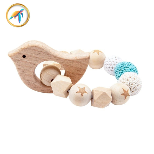 Anneau de dentition en bois pour bébé Turquoise Natura™ Oisillon